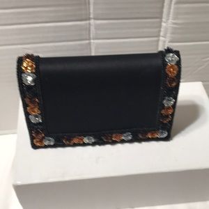 Carla March clutch with fabric strap